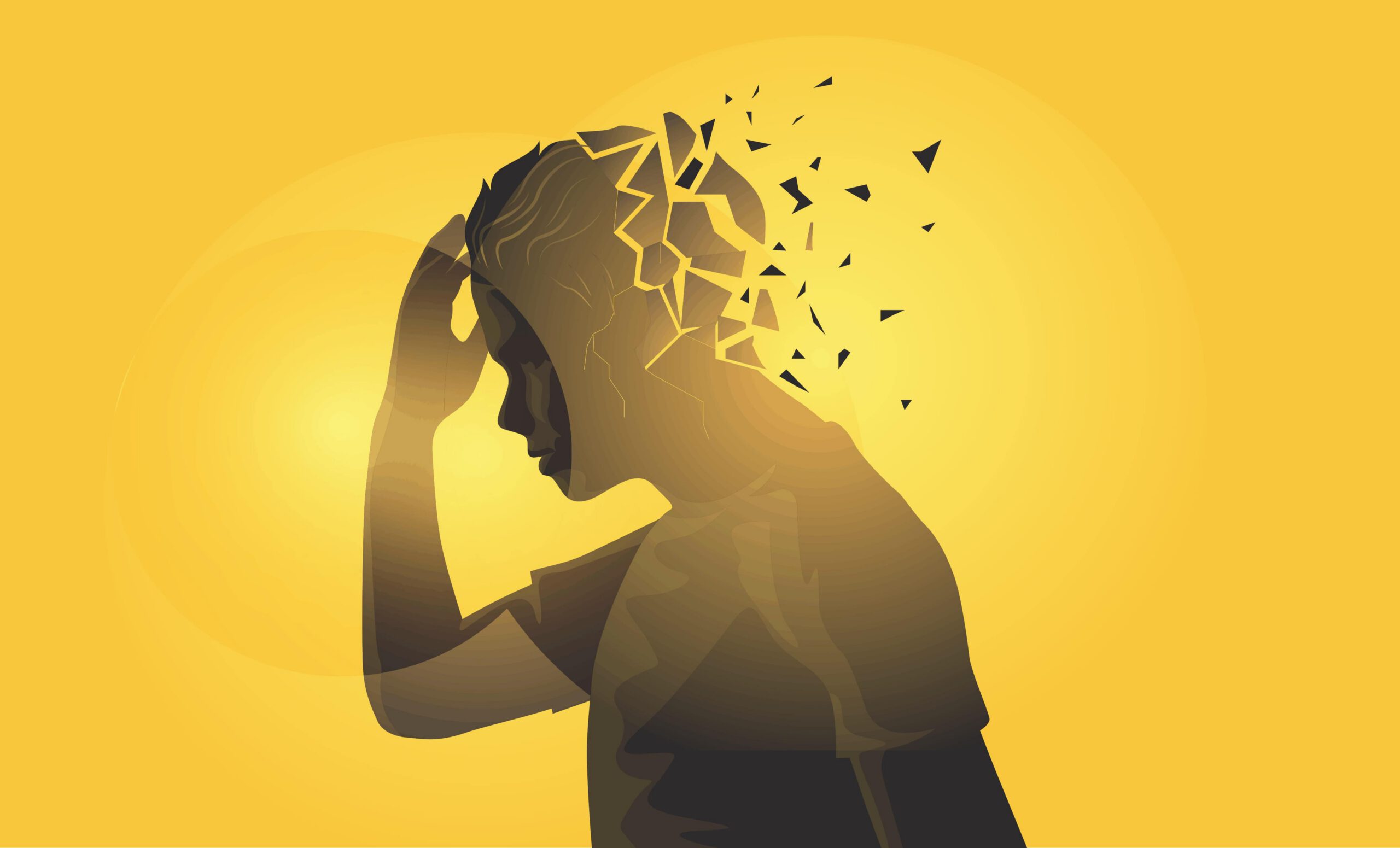 Man holding head as though in pain. Representative of mental health, physical health, and more. Man's back of head is shattered into fragments.